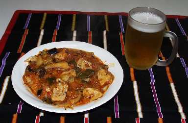 鶏唐揚げと夏野菜のトマト煮込み